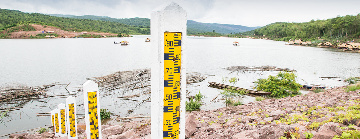 Poles for showing the water level in the reservoir is used to calculate the rate of release of water to farmers.