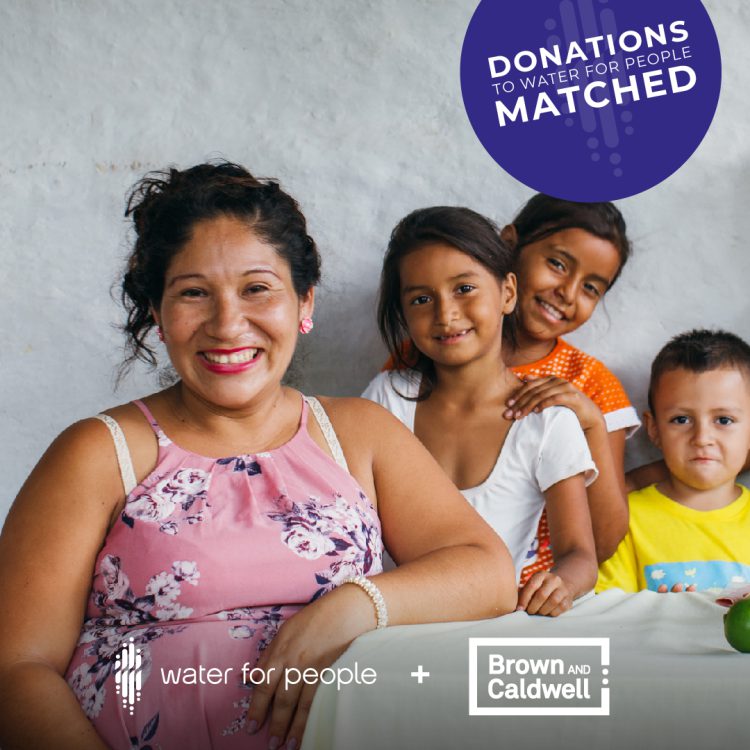 Water For People's Giving Tuesday image shows a mom, Maria, with her 3 kids